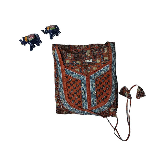 Women Anarkali | Orange angrakha pattern with tassels on side